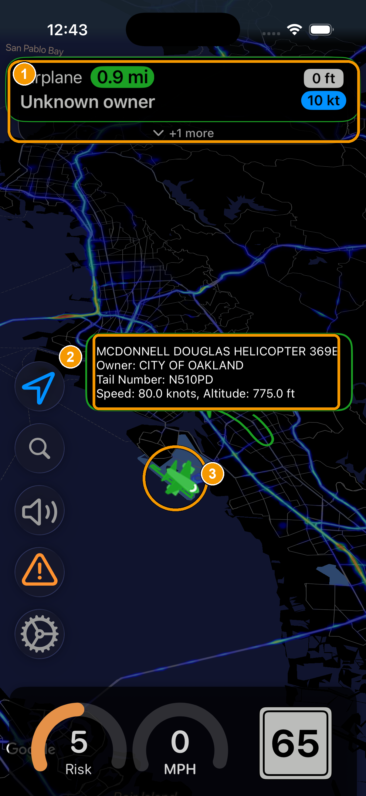 An aircraft alert banner and a helicopter marker on the map with its tapped details popup.